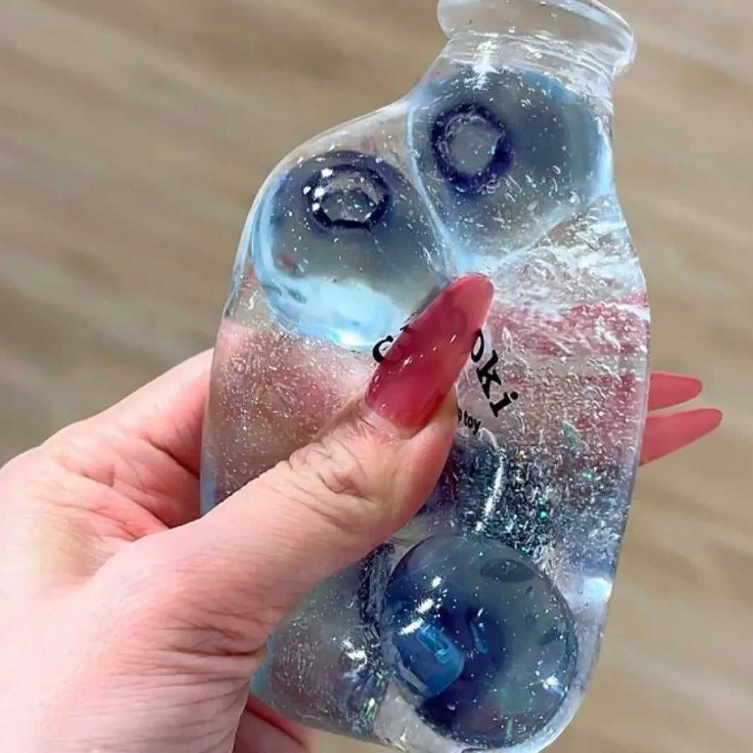 Squidhy anti-stress bouteille myrtille squishyverse