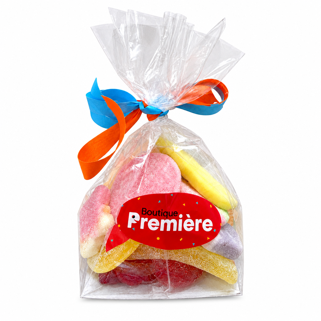 Sachet de bonbons suédois mélangés avec ruban bleu et orange, étiquette Boutique Première, sur fond blanc carré