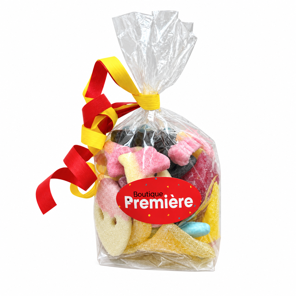 Sachet de bonbons suédois mélangés avec ruban rouge et jaune, étiquette Boutique Première, sur fond blanc carré